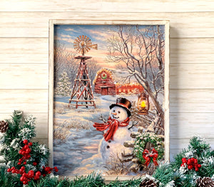  The snowman stands tall and proud, beckoning you to join him in a winter wonderland of joy and delight.  The wreath on the fence adds a touch of elegance and refinement, while the lantern hanging from the nearby tree guides you towards the warm glow of the red barn.