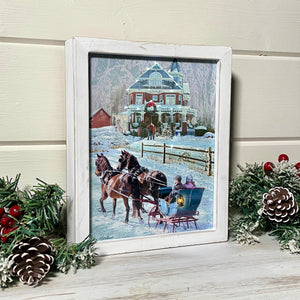 The intricate design features a cozy horse drawn carriage gliding through a serene snow-covered landscape. In the backdrop stands a stunning red Victorian style house that adds a touch of old-world charm to the scene.