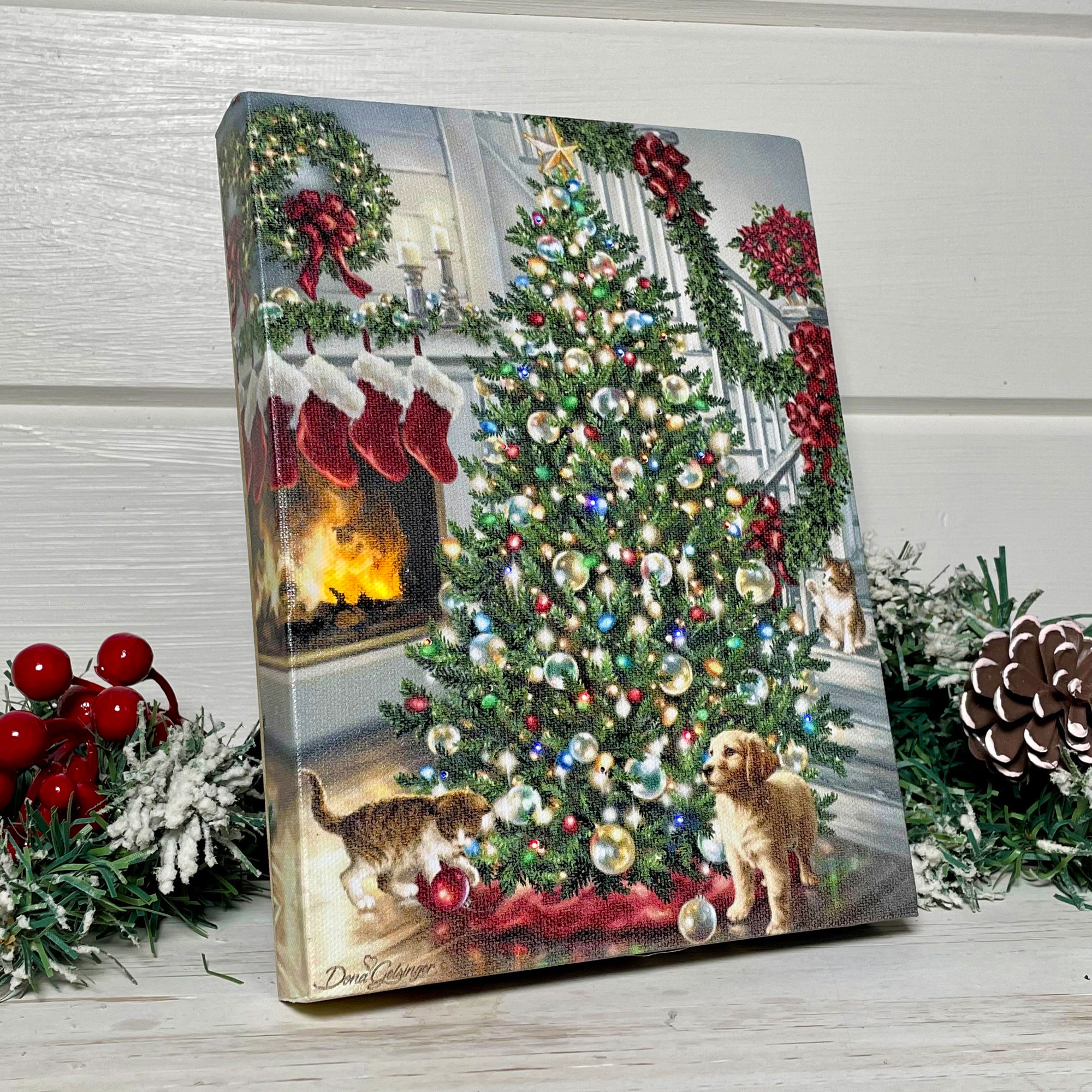 This stunning canvas features a fully decorated tree, complete with twinkling lights, sparkling ornaments, and a shining star on top. And what's a holiday scene without some furry friends? A playful puppy and adorable kittens frolic by the tree.