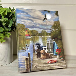 three adorable dogs sitting by your side as you take in the serene beauty of the lake.  As you relax in the comfortable chair on the dock, you'll be mesmerized by the peaceful view of ducks swimming in the crystal clear water and a majestic sailboat gliding by.