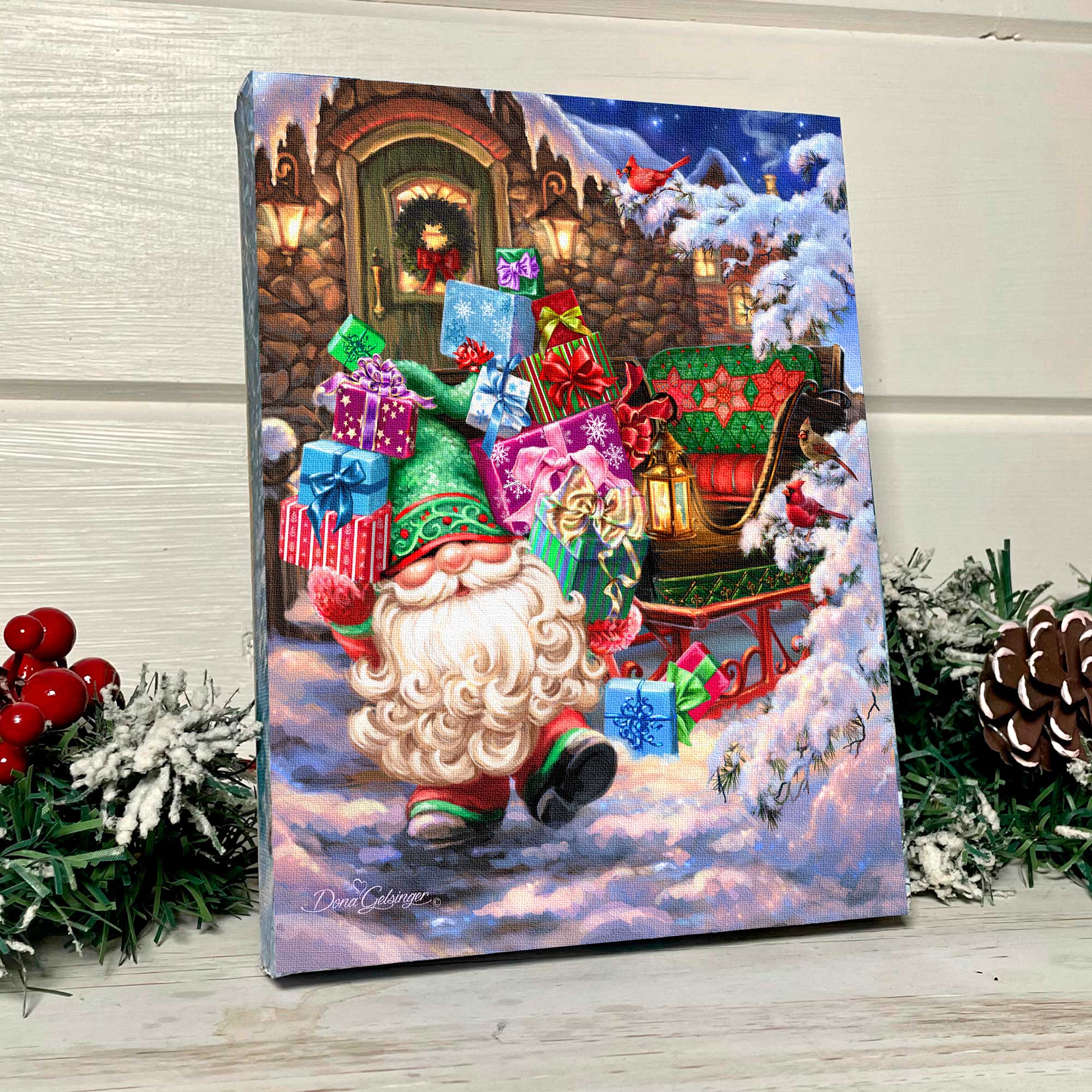 This delightful canvas features a cheerful gnome standing amidst a snowy landscape, his arms overflowing with presents for all the good boys and girls.  In the background, a cozy stone cottage and a festively decorated sleigh add to the enchanting scene.