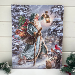 This enchanting canvas depicts Saint Nicholas braving a snowstorm with a bag full of toys and a lantern to guide his way. As he walks through the winter wonderland, he is accompanied by adorable bunnies and charming cardinals who stand by his side.