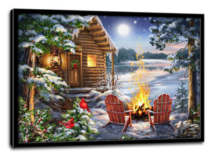  This stunning piece features a cozy cabin nestled by a shimmering lake, with two charming robins perched on a nearby branch. The scene is completed with two inviting Adirondack chairs and a crackling fire to warm your heart.