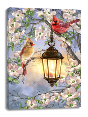 Featuring two lovebirds perched atop a tree bursting with delicate blossoms, this stunning piece of art captures the essence of springtime romance. The gentle glow of the lantern, chained to the trunk of the tree, adds a touch of warmth and charm to the scene.