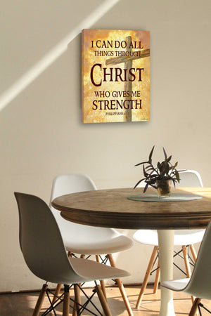 All Things Through Christ Canvas Wall Art is a cross with Philippians 4:13 written on the canvas. The canvas is staged in a kitchen.