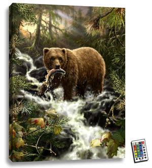 Behold the captivating sight of a majestic grizzly bear standing in a tranquil stream, proudly holding a fresh salmon in its mouth. The intricate detailing of the artwork, coupled with the vibrant LED illumination, creates a mesmerizing display that brings the wilderness to life.