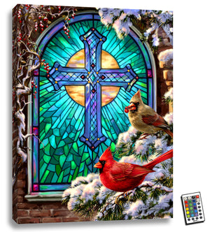  This stunning 18x24 piece features two graceful cardinals perched on a snow-covered branch, set against a backdrop of richly colored stained glass.