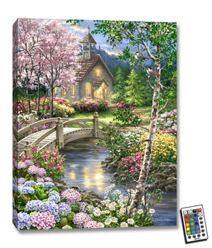  the exquisite stream that flows through this picturesque scene. Lush flowers line both sides of the stream, creating a natural pathway that leads to a charming chapel nestled in the distance.  Take in the breathtaking view of the walking bridge that spans across the stream.