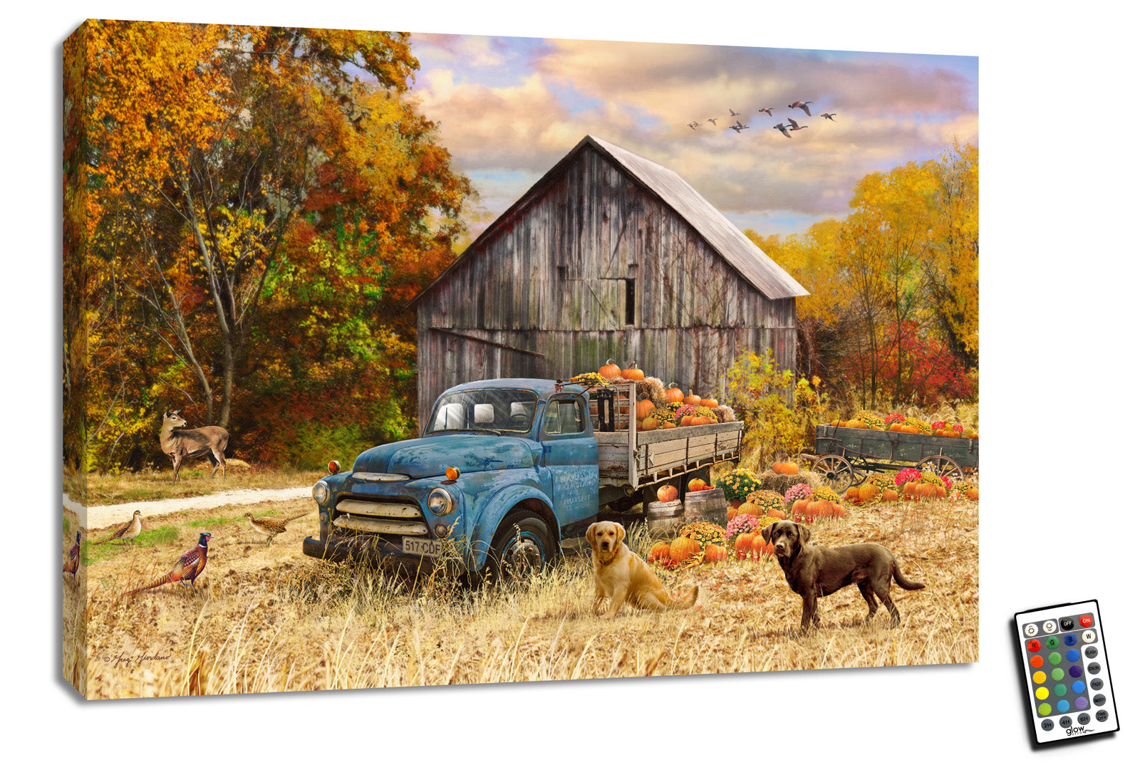 This stunning piece features a charming scene of a couple of dogs, surrounded by the bounty of the harvest season.  In the foreground, an old blue truck overflows with pumpkins and other fall-themed decorations, while in the distance, a rustic barn stands proudly against a backdrop of vibrant foliage. The scene is brought to life by the presence of deer, ducks, and pheasants, adding a touch of wild beauty to the already stunning vista.