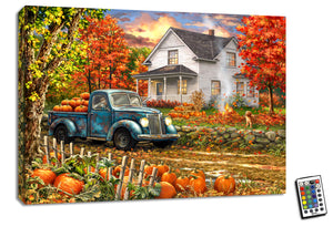 This charming piece captures the essence of autumn with an old-fashioned blue truck, brimming with plump, orange pumpkins. Parked in front of a cozy country house, this scene is made even more heartwarming by the presence of an adorable golden retriever puppy in the front yard.
