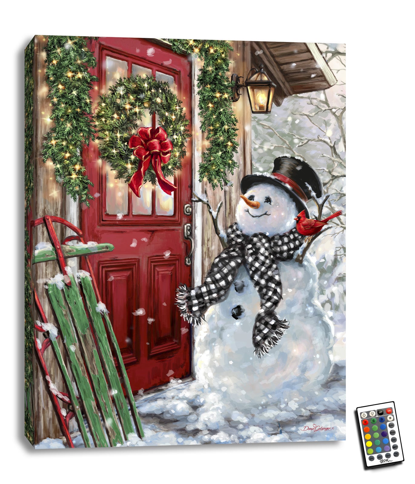 This delightful piece features a jolly snowman, complete with a top hat and scarf, standing proudly beside a classic red door adorned with a beautiful wreath. On the other side of the door, a wooden sled adds a touch of whimsy to this winter wonderland scene.