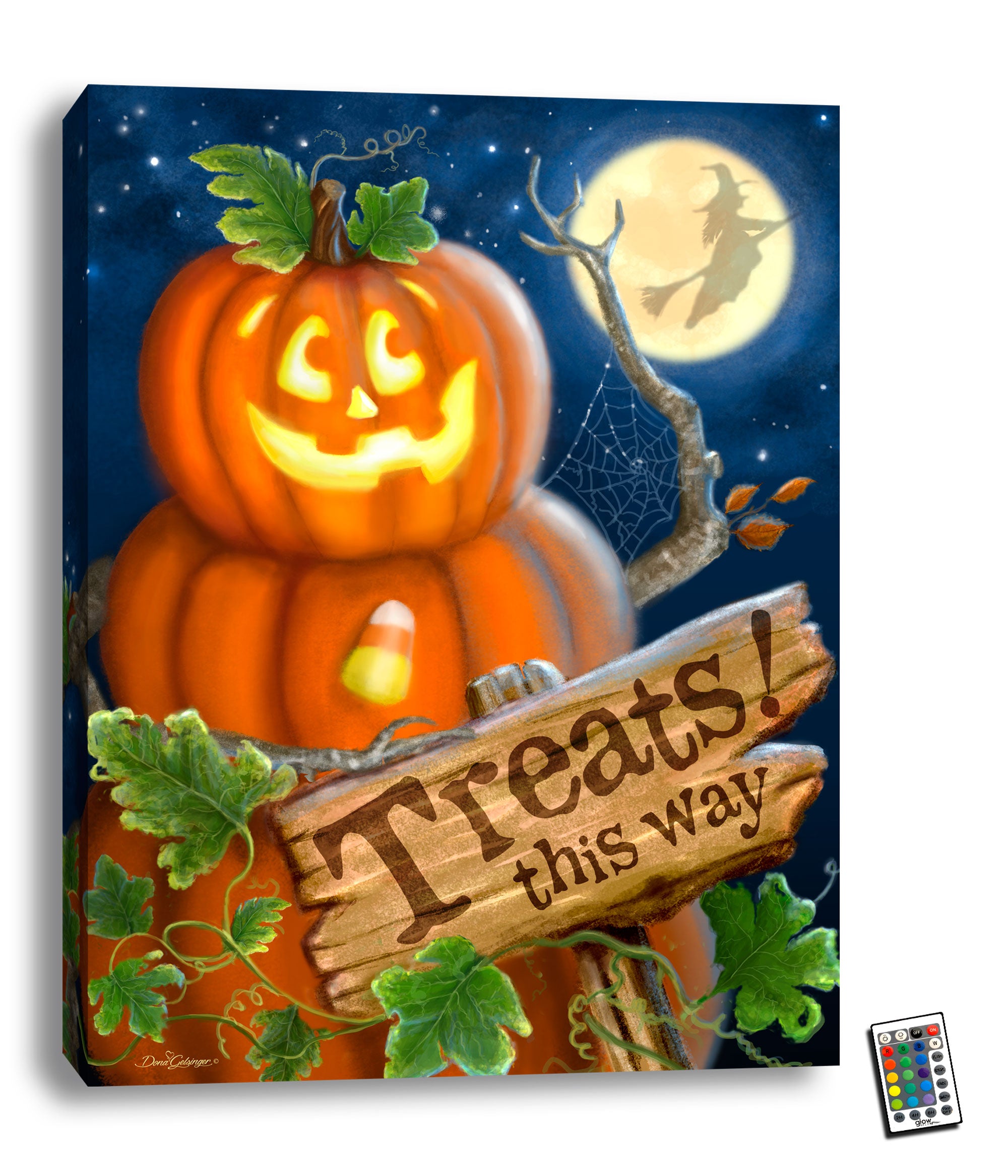 Featuring a grinning jack-o-lantern stacked on two other pumpkins like a snowman, this wall art is sure to bring a smile to your face. The sign in front of the pumpkin trio reads "treats this way!", inviting trick-or-treaters and guests to come closer and enjoy the Halloween festivities.