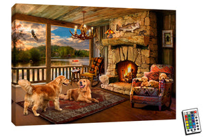 In this stunning scene, two golden retrievers sit contentedly on a plush rug, basking in the warmth of a roaring fireplace. Nestled in a cozy cabin by the lake, three adorable puppies sit nearby, adding to the heartwarming atmosphere.  The rustic charm of the cabin is brought to life with the striking antler chandelier and a prized catch, a large mouthed bass, mounted above the fireplace.