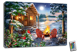  Imagine snuggling up with your loved one in one of the two Adirondack chairs that sit by a crackling fire, surrounded by the serene beauty of a cabin nestled by a peaceful lake. Two sweet robins sitting on a branch add a touch of whimsy and natural charm to the scene. 