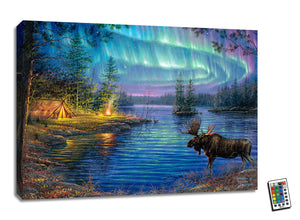 As you gaze upon this stunning piece, you'll be transported to a serene lakeside where a majestic moose stands on the water's edge. The northern lights dance in the sky, painting the night sky in vibrant hues of green and purple.  The scene is complete with a cozy tent illuminated by the warm glow of a roaring fire.