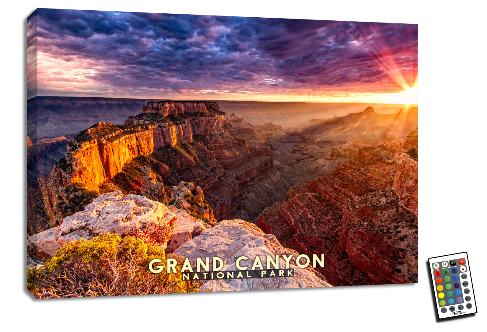 This stunning piece captures the majesty of the canyon as the sun sets, casting a warm glow over the rugged terrain.  As you gaze at this mesmerizing masterpiece, you'll feel as though you're standing at the edge of the canyon, taking in the awe-inspiring vista before you.