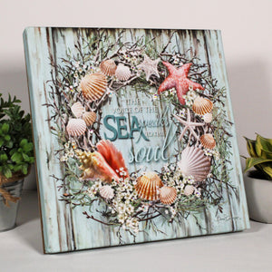 Indulge in the serene allure of the Coastal Wreath Pizazz Print with Dazzling Crystals, where the tranquil voice of the sea speaks to your soul. Adorned with delicate starfish, exquisite seashells, and captivating conchs, this stunning canvas captures the essence of the ocean's beauty.