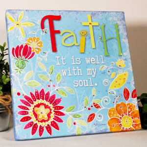This captivating masterpiece boasts a whimsical scene of brightly painted flowers and swirling colors, transporting you to a world of pure romance.  With "faith it is well with my soul" beautifully inscribed on the canvas, this print is a reminder to hold on to your faith and trust in a higher power.