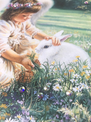 An Angel's Care Pizazz Print with Dazzling Crystals. Zoom in of the young angel and bunny