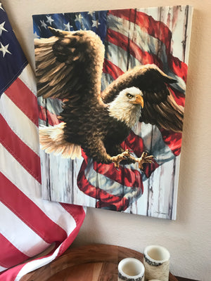Imagine a majestic eagle soaring through the skies, its talons spread wide in flight, with a waving flag in the background - a symbol of the unyielding spirit of the American people.