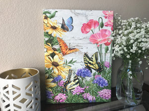 Transform your home into a serene haven with our Butterfly Garden Canvas Wall Art. Delicate butterflies flutter gracefully amongst a colorful array of flowers, creating a captivating and dreamy ambiance.