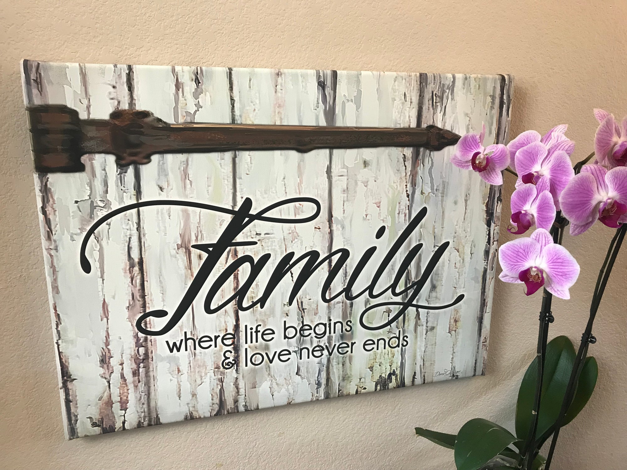 Featuring the heartwarming phrase "Family where life begins & love never ends" written in elegant script